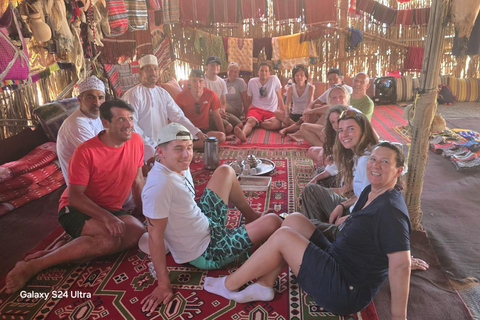 Shared Wahiba Desert Tour with Wadi, Cave, Bedouin & Sunset
