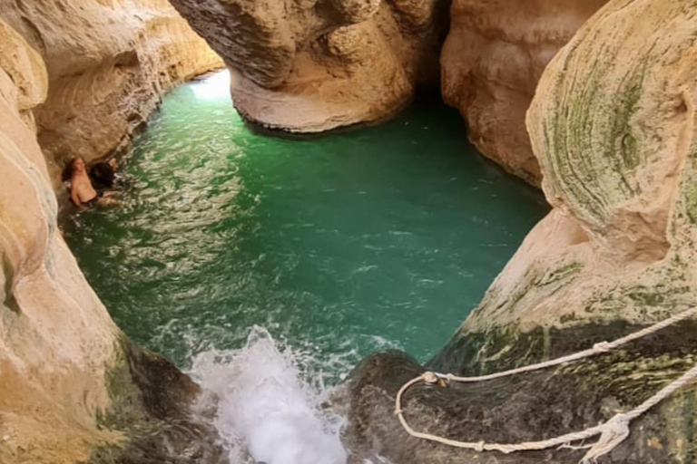 Sharing Tour to Wadi Shab Hike, Swim, Cave, Sinkhole, & Fins Shared Wadi Shab Tour - Meeting at Wadi Shab Parking Area