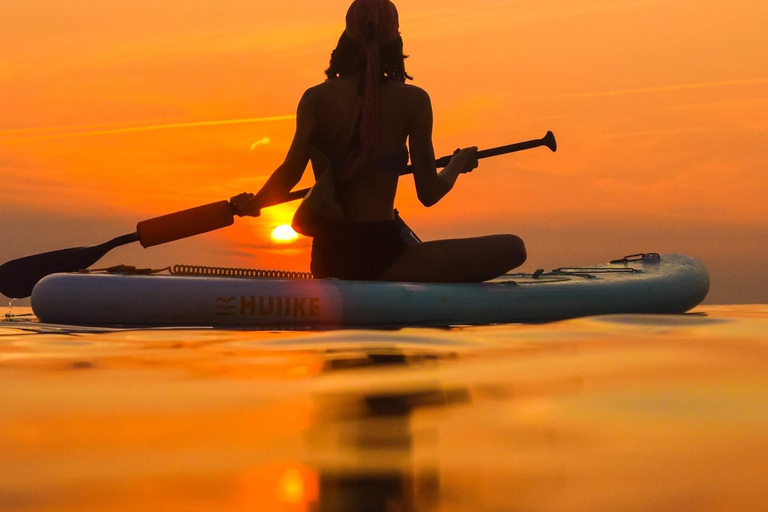 See the Sunrise in Copacabana from a Stand Up Paddleboard with Photos