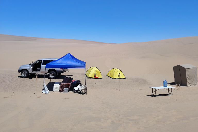 Huacachina: Overnight Camping with Sandboarding/Sandsky, Bar, BBQ, and Campfire