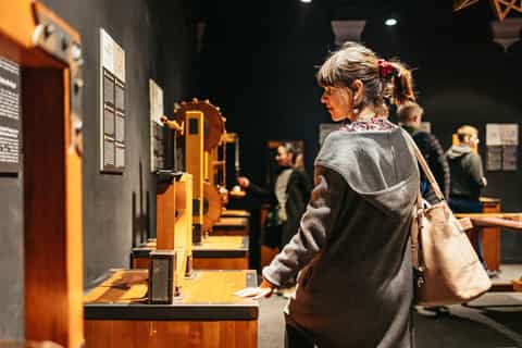 Visitors operating da Vinci’s machines with an entry ticket