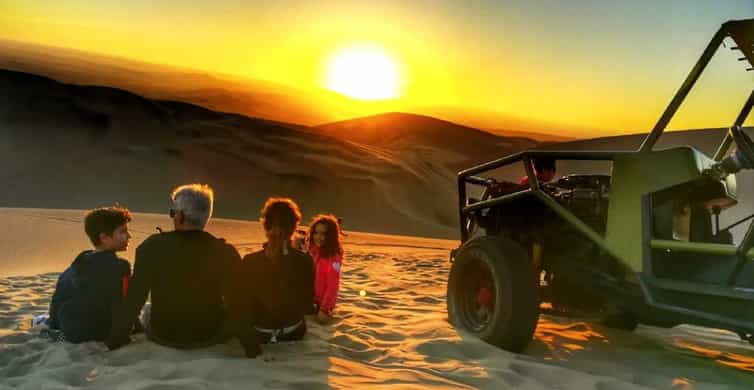 Ica Guide From Ica | Sandboarding in the Ica desert at sunset | GetYourGuide