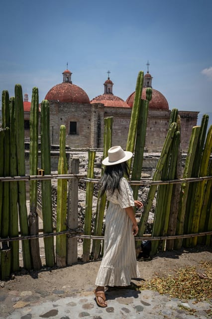 Green-stone colonial façades along a pedestrian street in Oaxaca’s historic centre