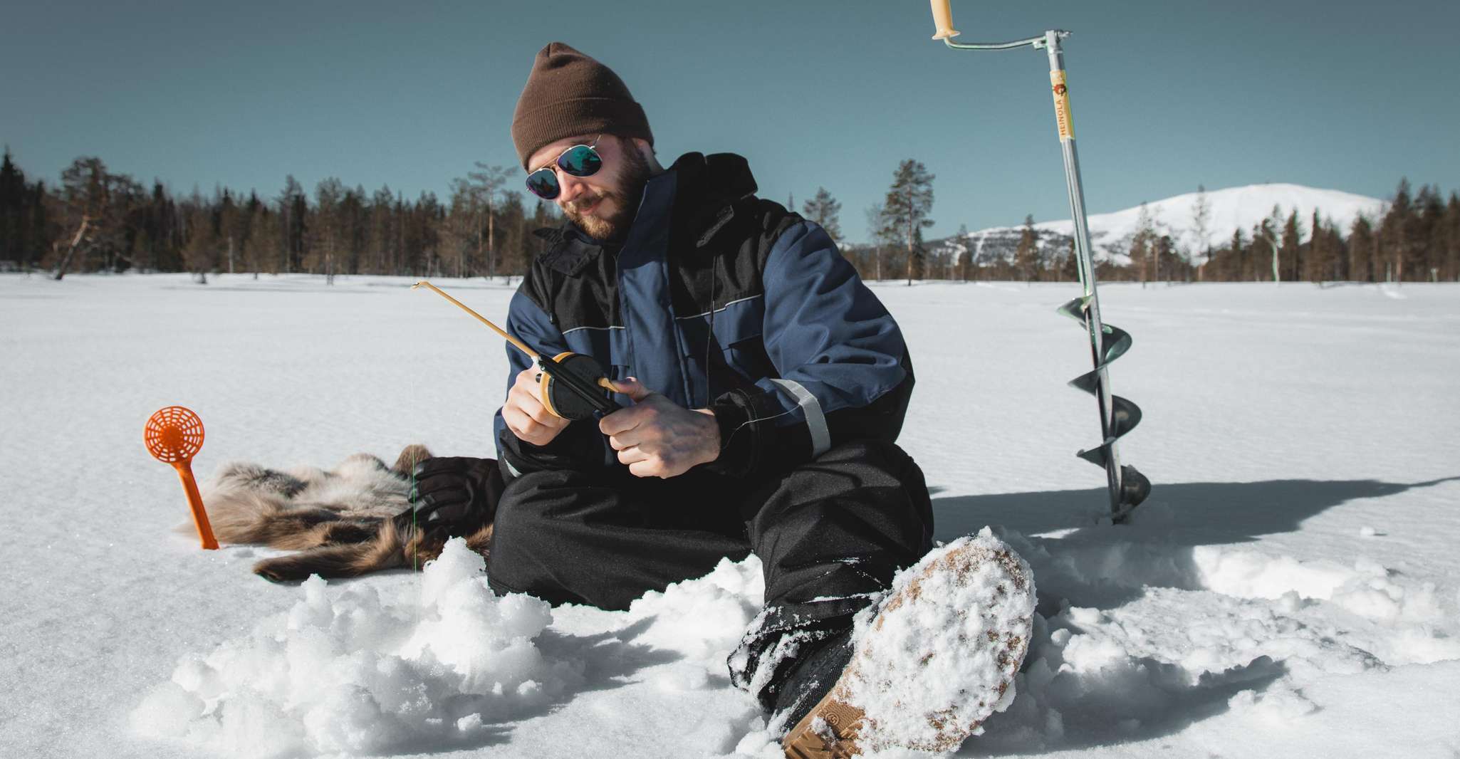 Saariselkä, expérience de pêche sur glace arctique - Hizvo