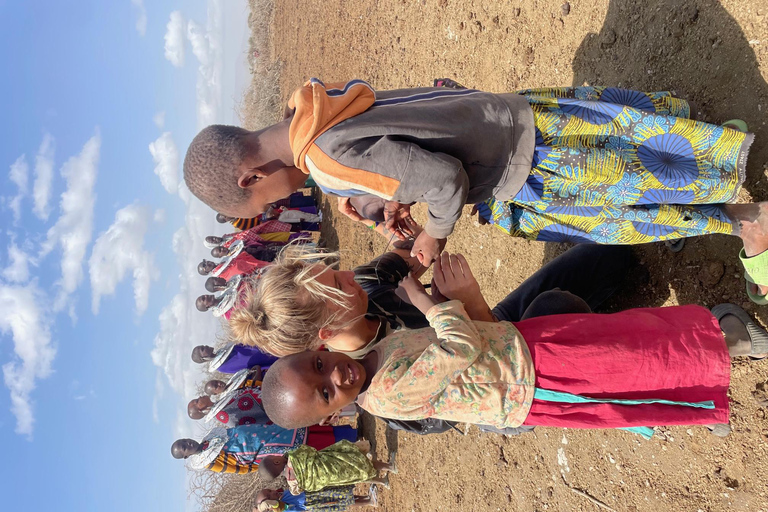 Esperienza culturale Maasai Boma (tour del villaggio maasai)Esperienza culturale Maasai Boma (con pranzo e bevande)