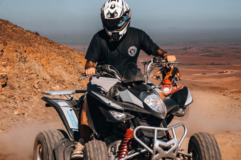 Marrakech: Tour del deserto di Agafay con quad, giro in cammello e cena