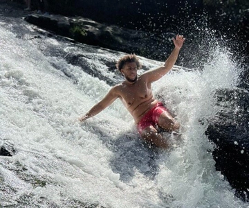 San Juan: El Yunque Waterslide & Waterfall Tour z przekąskami
