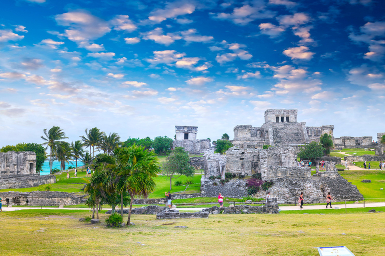 Tulum: Highlights tour with cenote & jungle village. German tour guide. Tulum highlights half-day option with pick-up available from Cancun area