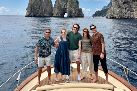 Capri Boat Tour with Caves, Swimming, Aperitif and Champagne From Capri: PRIVATE Capri Boat Tour