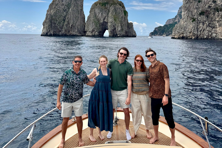 Capri Boat Tour with Caves, Swimming, Aperitif and Champagne From Capri: PRIVATE Capri Boat Tour