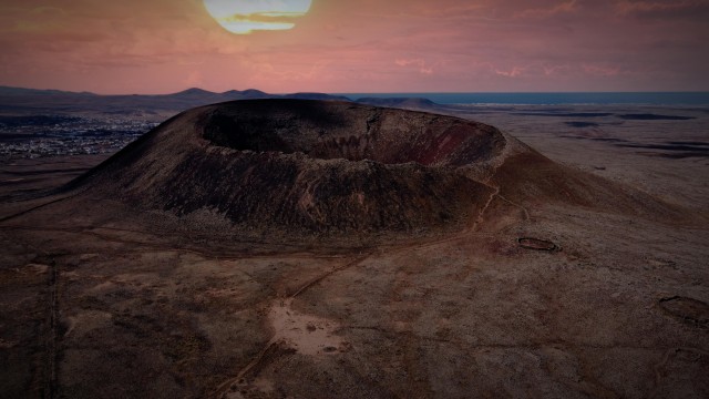Visit Sunset from the volcano in Corralejo