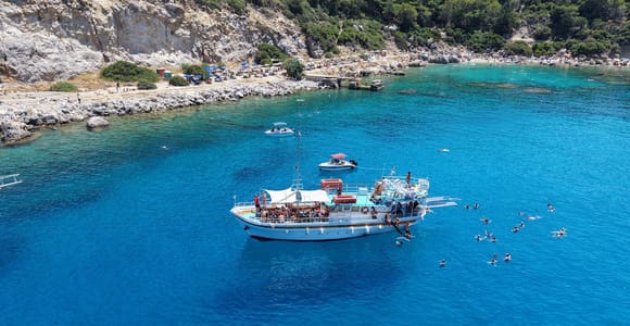 6h swimming to: Anthony Quinn,Kallithea,Afandou with snacks