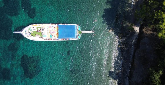Kusadasi: Boat Trip with Transfers, Lunch & Unlimited Drinks