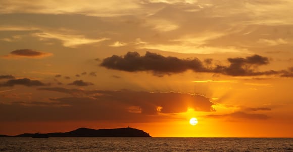 Ibiza: Sunset Boat Trip with Snorkeling, Kayaking, & Drinks