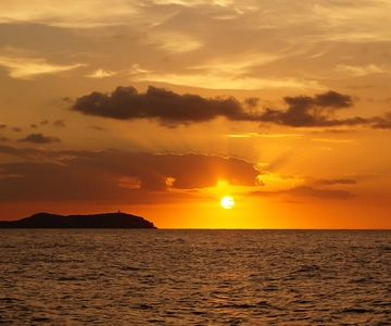 Ibiza: Sunset Boat Trip with Snorkeling, Kayaking, & Drinks