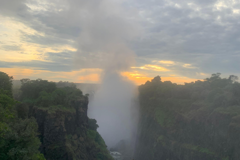 Victoria Falls Sunrise Guided Tour & Local Market Experience Victoria Falls: Sunrise Guided Tour with Souvenir Market