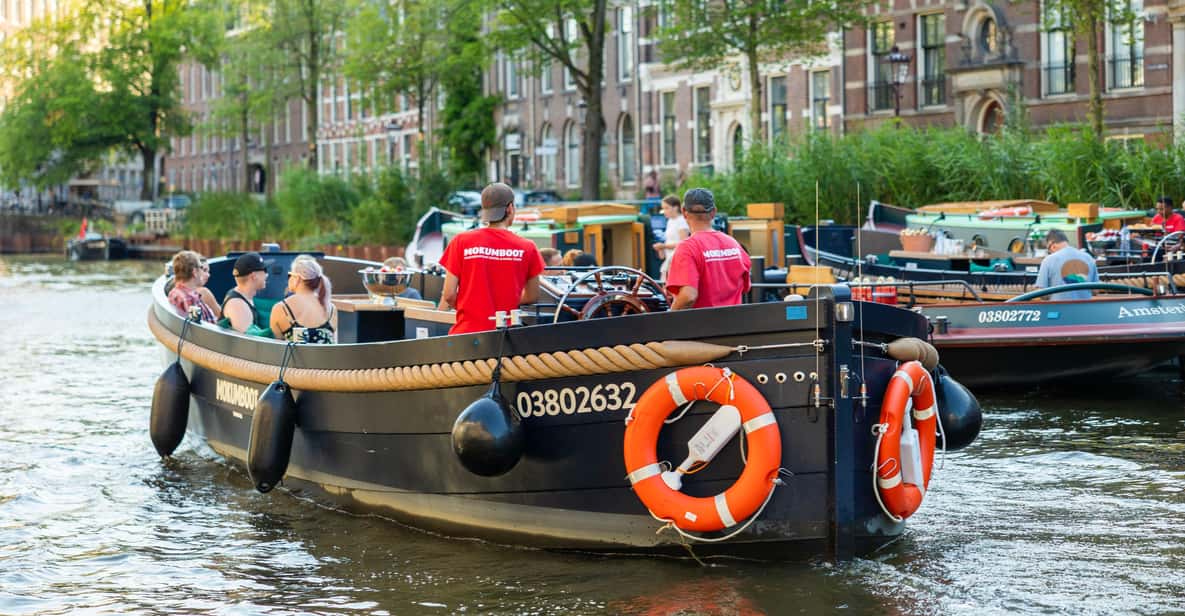 Afbeelding 12 van Amsterdam: begeleide open boottocht met onbeperkt drankjes