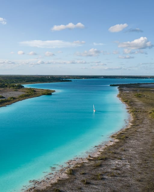 Private sailboat tour across the Bacalar seven colors lagoon | GetYourGuide