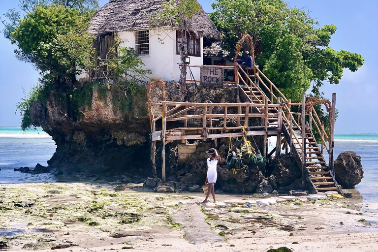 Zanzibar: laguna blu, ristorante sulla roccia, grotta e spiaggia