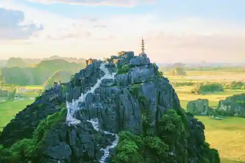 From Hanoi: Tam Coc Boat Trip and Hoa Lu & Mua Cave Tour