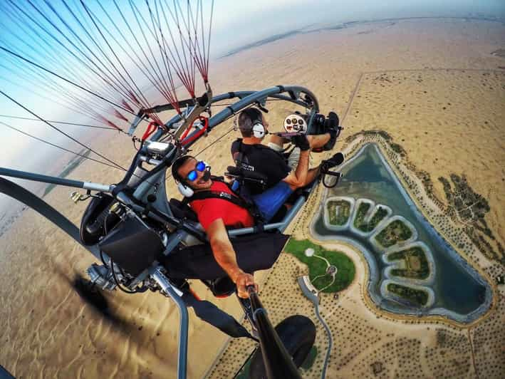 Dubai: Tandem Paramotor Tour Over Love Lake with Transfers | GetYourGuide