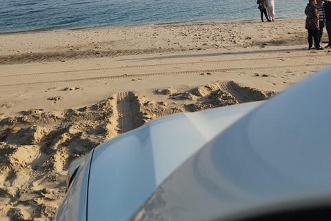 Doha: inland sea Tour With Dune Bashing &Sandboarding fun Doha: safari , camel ride, sandboarding hotel pickup