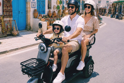 Djerba in Electric Mode: 3 Wheels, 3 Adventurers, Ready to Explore the Island? Djerba: Electric 3-Wheeler Ride for a Fun Family Experience