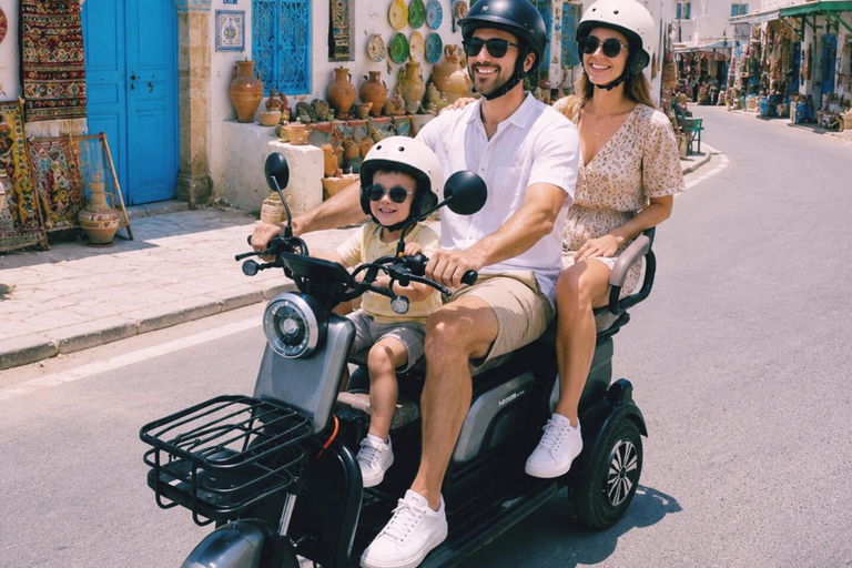 Djerba in Electric Mode: 3 Wheels, 3 Adventurers, Ready to Explore the Island? Djerba: Electric 3-Wheeler Ride for a Fun Family Experience