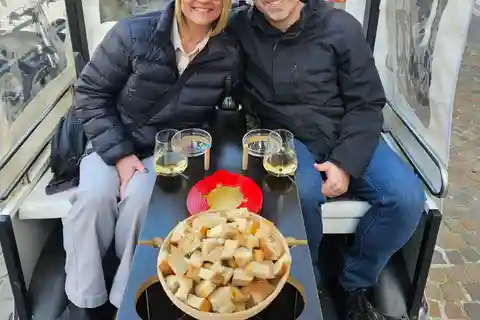 Fondue and wine private Tuk Tuk tour in Geneva