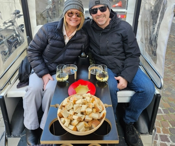 Fondue and wine private Tuk Tuk tour in Geneva
