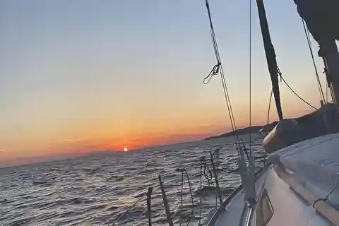 Tinos Sunset Cruise with Meal and Drinks