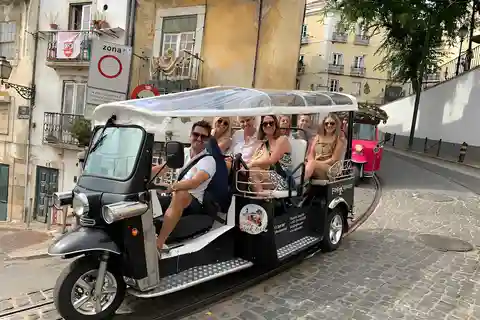 True 4Hour/Half day TukTuk Tour of Lisbon - Local Overview!