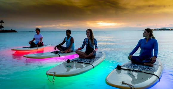 Honolulu: Night SUP Yoga Class