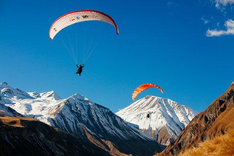 Tbilisi to Gudauri Tour with Rafting Horseback & Paragliding