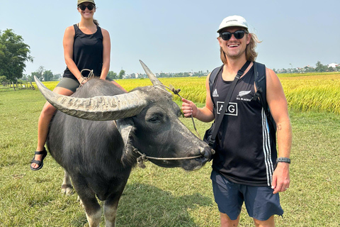 Hoi An Bike Tour: Ride a Buffalo & Duck Farming Experience Hoi An Bike-Organic Farm-Duck game-ride Buffalo-Basket boat